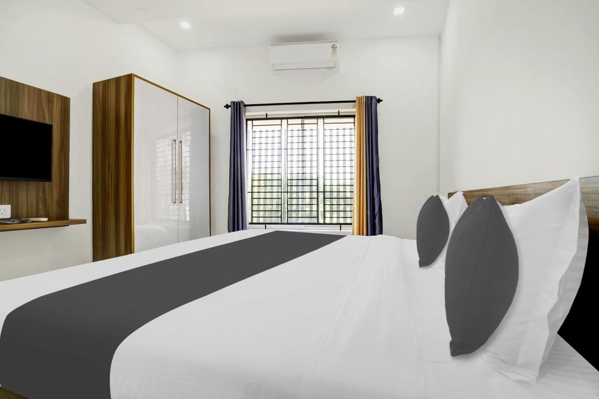 Hotel O Grand Parassini Pappinisseri Exterior photo
