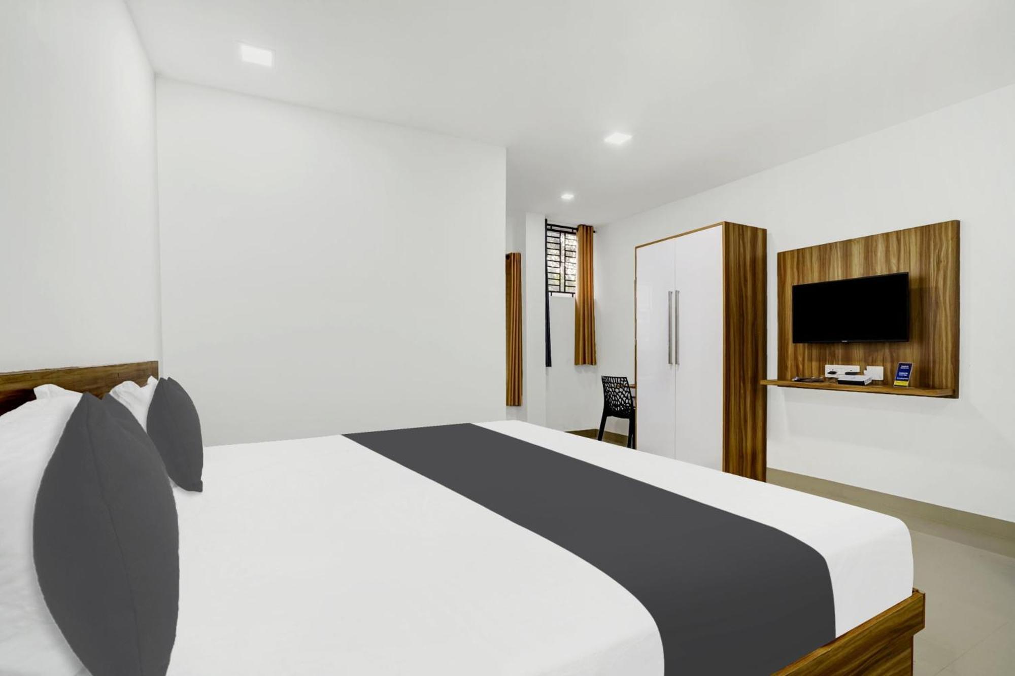 Hotel O Grand Parassini Pappinisseri Exterior photo